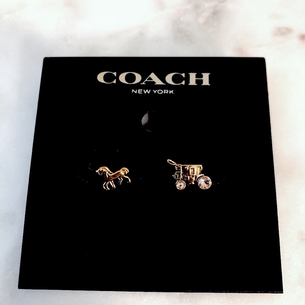 NWT Coach horse and carriage earrings gold